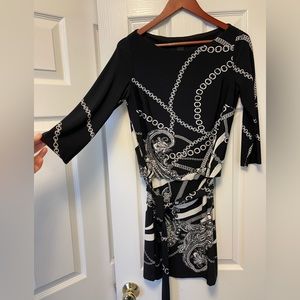 Beautiful woman’s soft black/white chain link detail dress